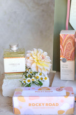 thoughtful gift for mum with chocolate hand cream and self care items.