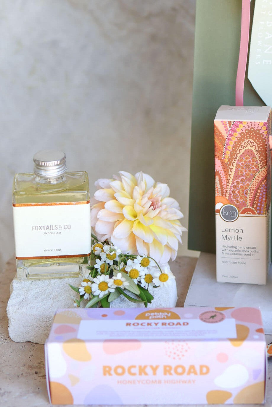 thoughtful gift for mum with chocolate hand cream and self care items.