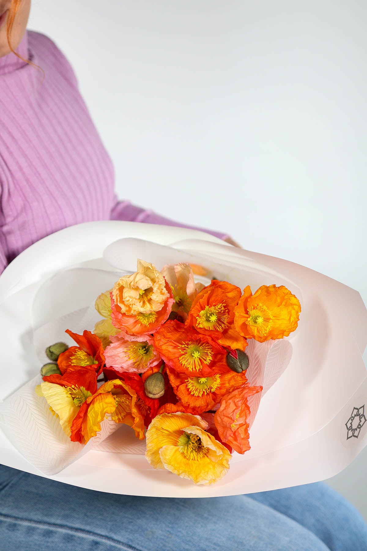 Vibrant fresh flower bouquet wrapped for same-day Brisbane delivery – Poppy Wrap design