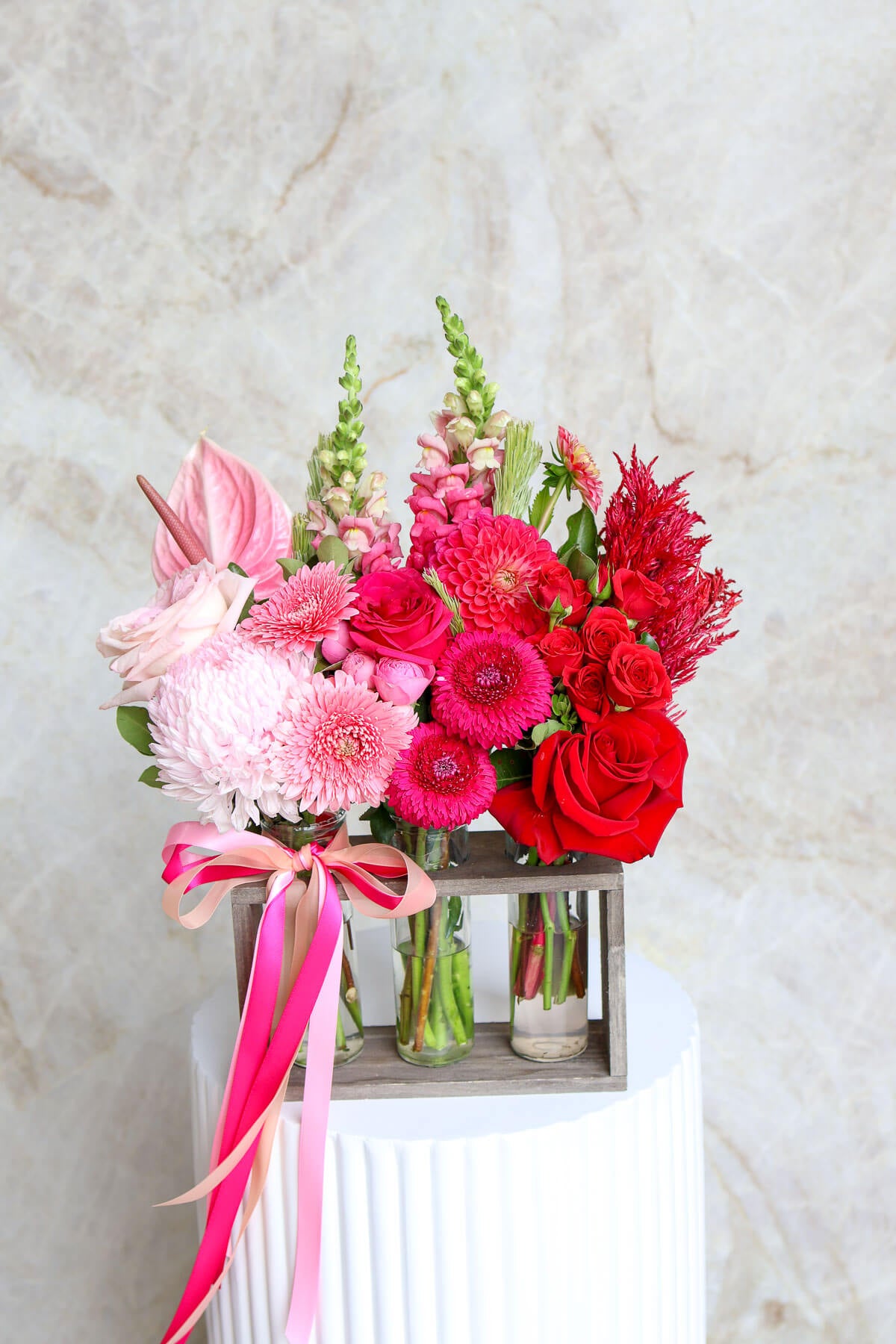 Stylish Valentine’s flower arrangement in three mini vases Brisbane.