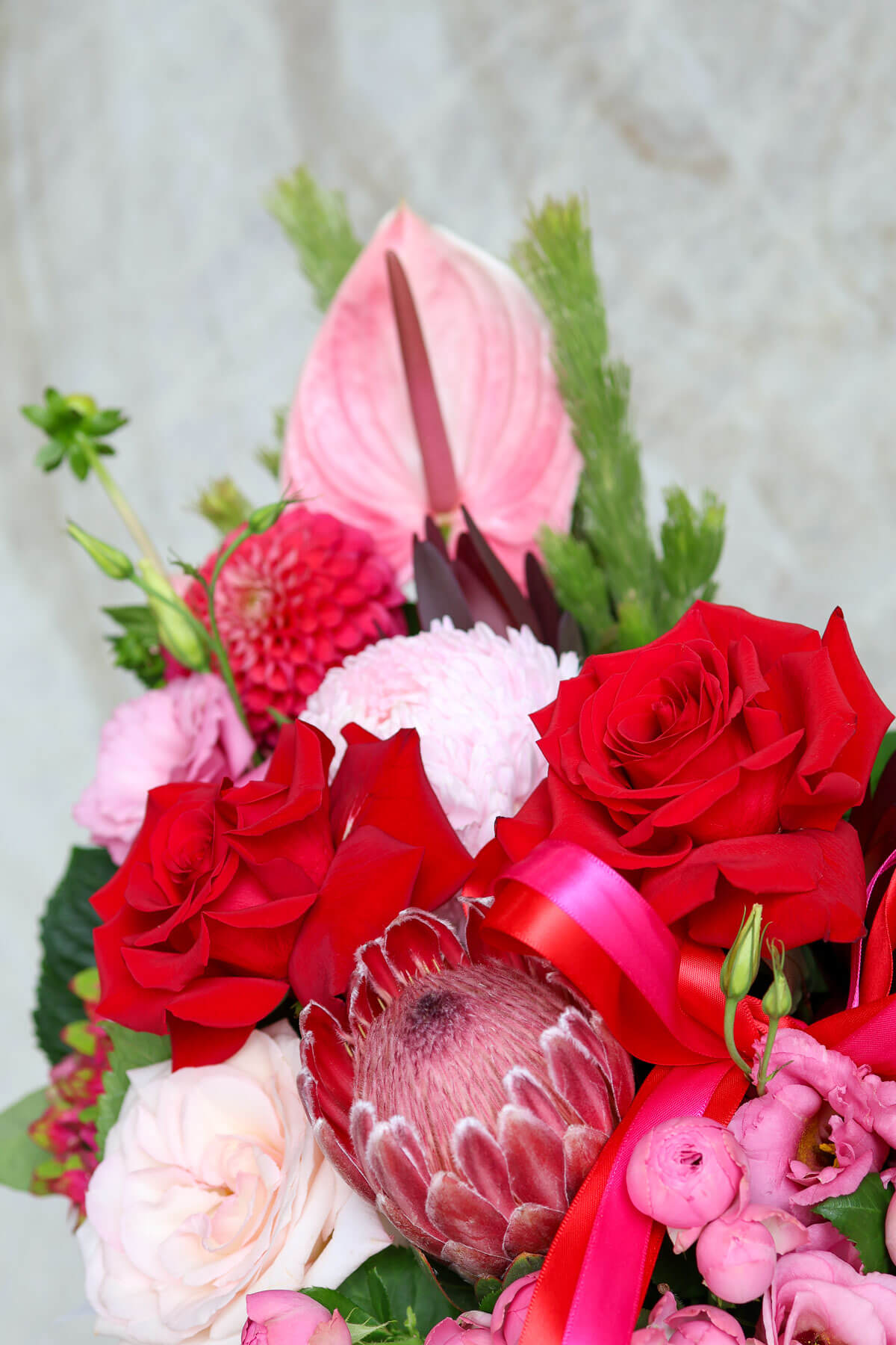 Elegant Valentine’s flower delivery Brisbane with roses and anthuriums.