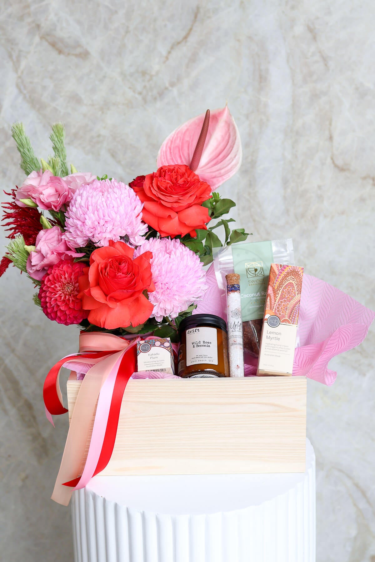 Premium Valentine’s hamper arranged in reusable wooden crate.