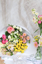 Chamomile and freesia Easter table centrepiece