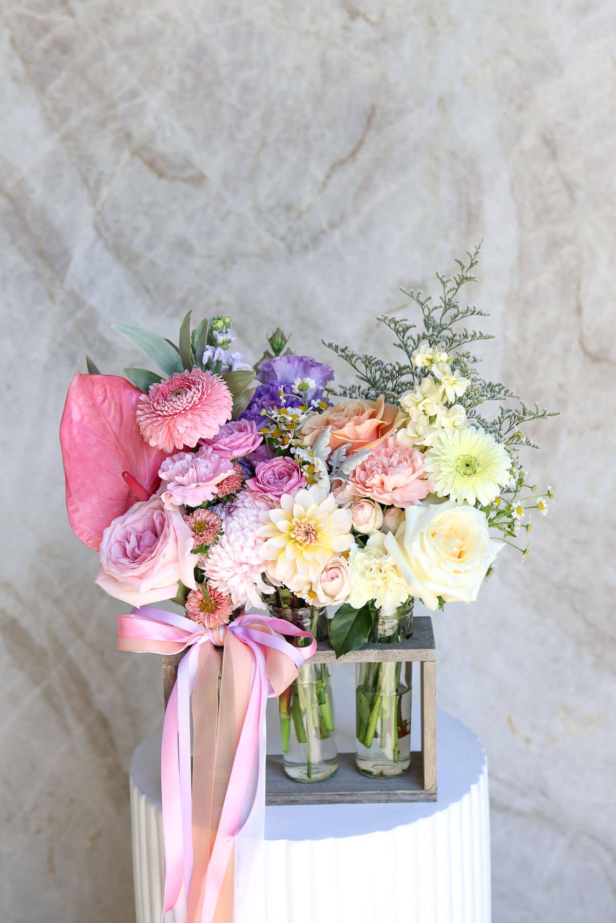 Mother's Day trio vase set with pastel roses and seasonal blooms in Brisbane.