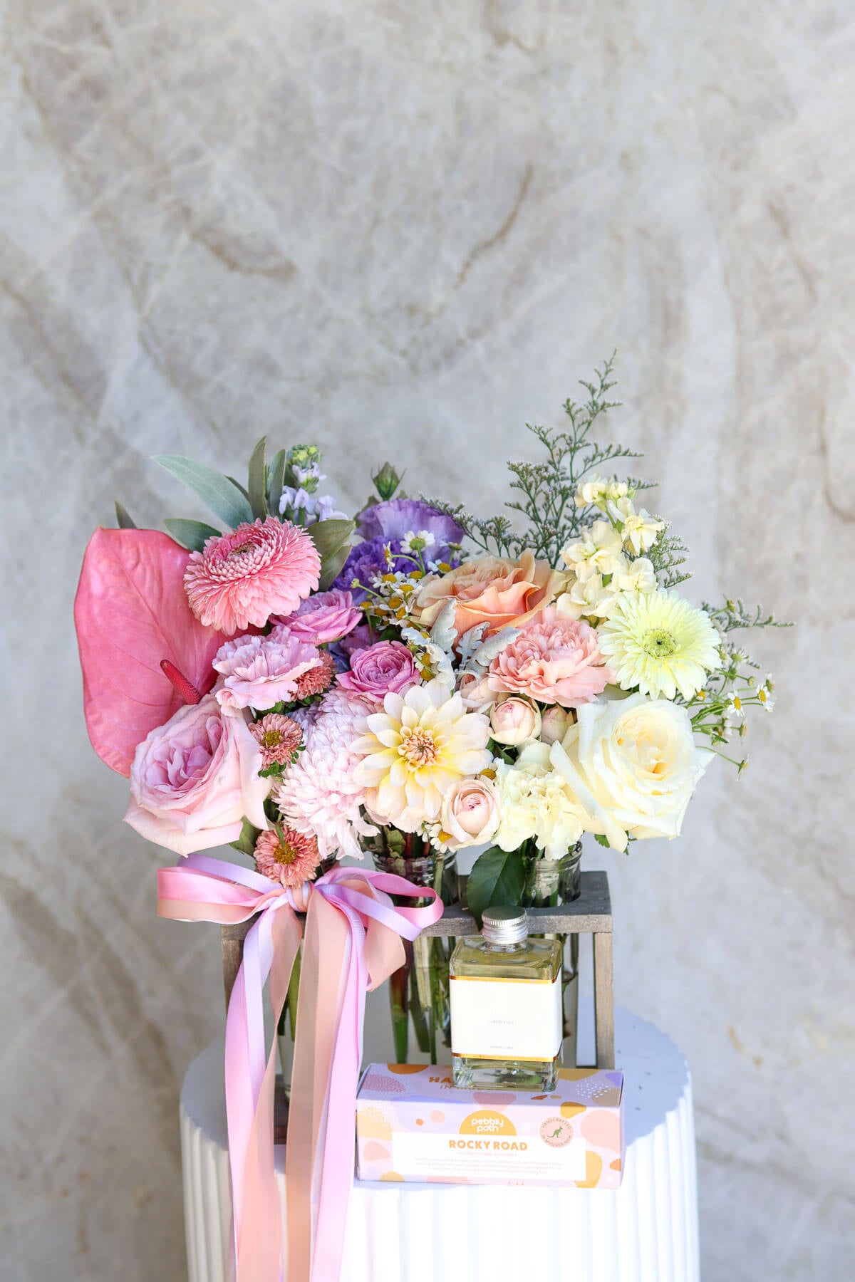Mother’s Day pastel flower trio in glass vases with cocktail and rocky road gift.