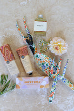 Floral garden tool set gift hamper with rocky road and Koh Living hand cream.