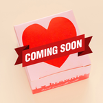 Pink box with red heart with Chocolate Brownie inside.