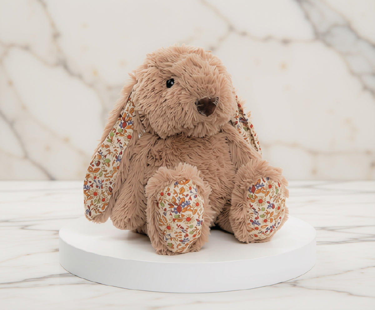 Brown bunny plush toy with vintage floral ears and feet.