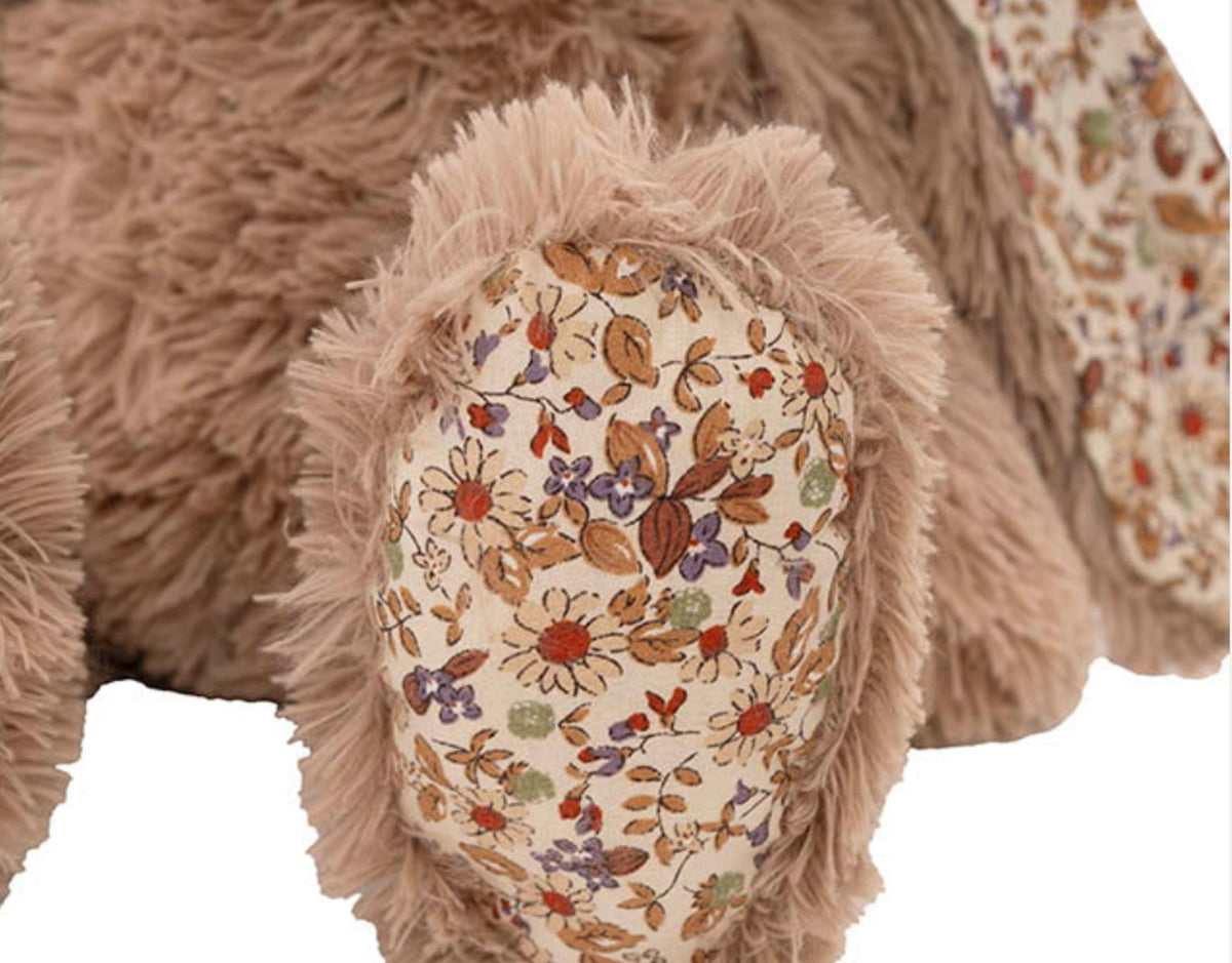 Vintage floral fabric detail on Bramble bunny plush.