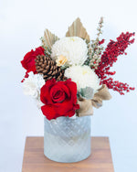 Noelle Christmas vase arrangement featuring red roses, white blooms, and festive foliage – Brisbane Market Flowers
